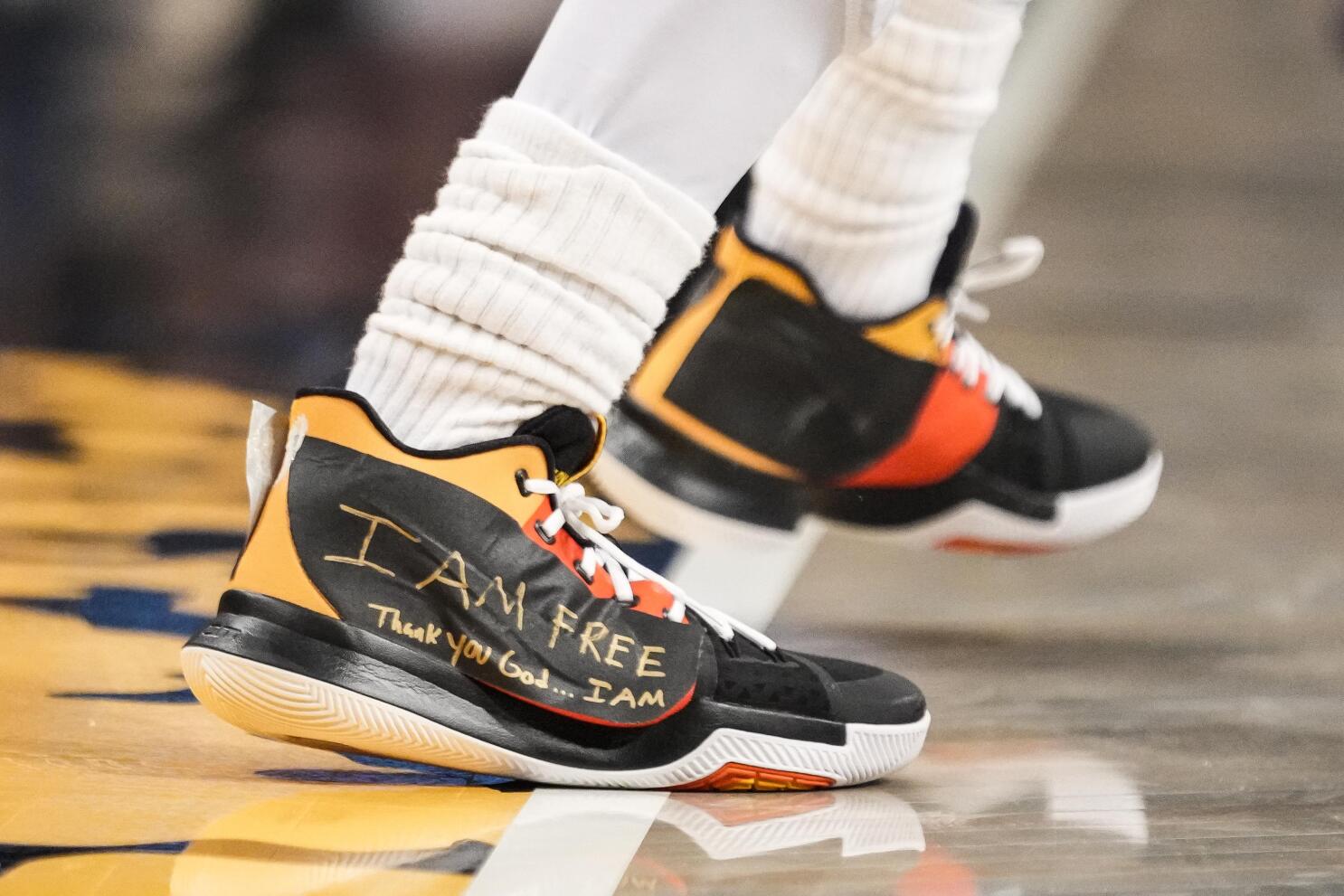 Irving touts freedom on game sneakers after split with Nike AP News